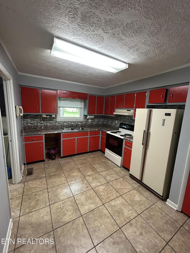 131 Oak Hill Dr, Jamestown, TN 38556 - kitchen featuring red cabinets, tasteful backsplash, dark countertops, under cabinet range hood, and white appliances