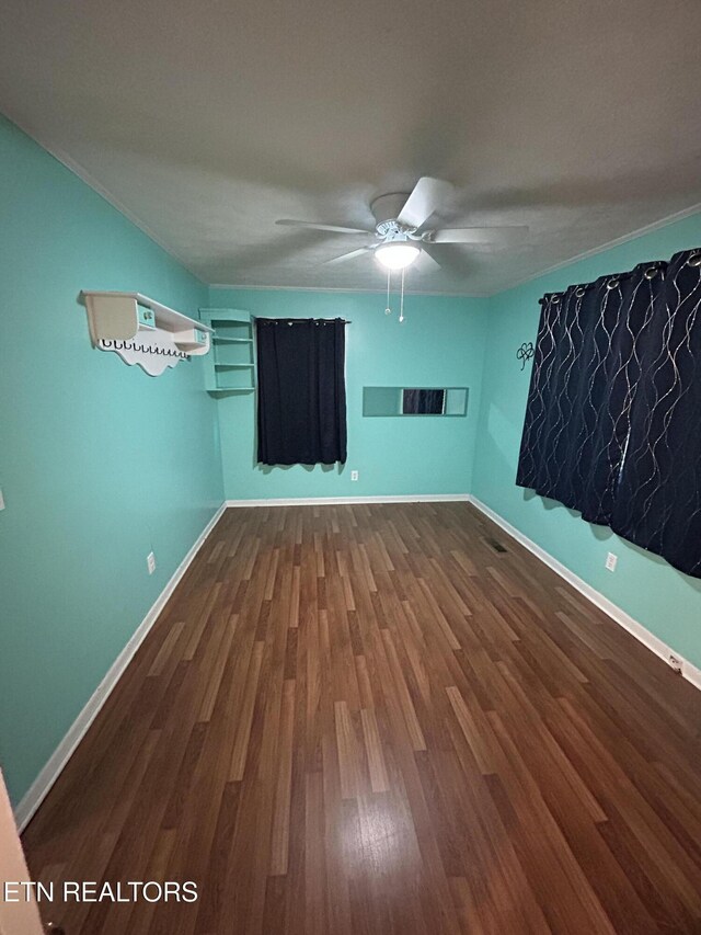 131 Oak Hill Dr, Jamestown, TN 38556 - unfurnished room with wood finished floors, ceiling fan, and baseboards