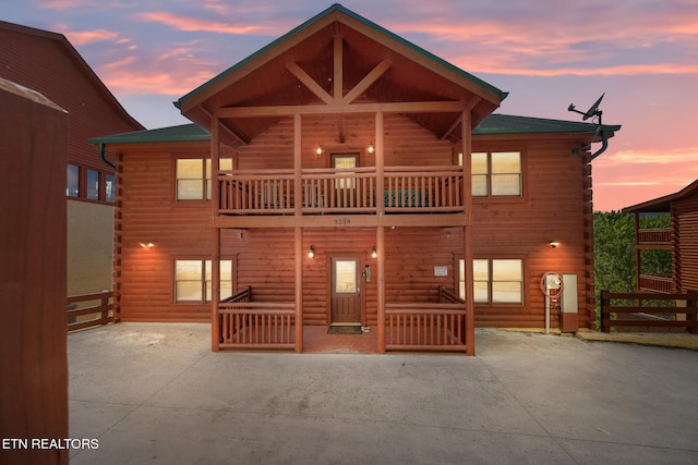 3238 Smoky Ridge Way, Sevierville, TN 37862 - back of house with fence, log siding, a patio, and a balcony