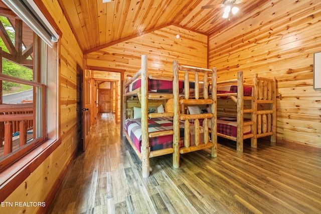 3238 Smoky Ridge Way, Sevierville, TN 37862 - bedroom featuring wood walls, wooden ceiling, wood finished floors, and lofted ceiling