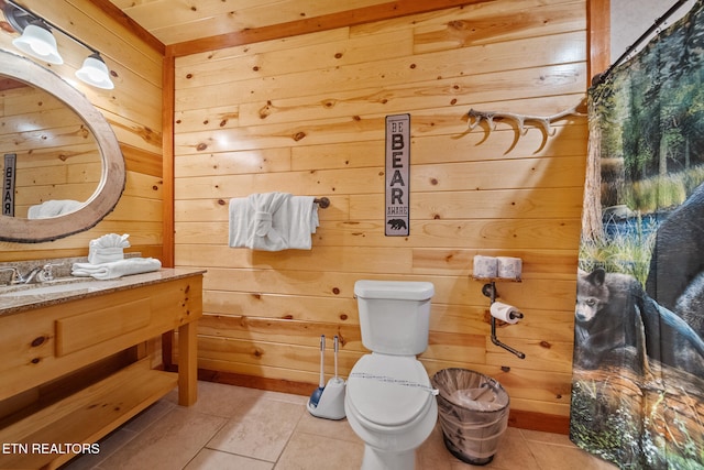 3238 Smoky Ridge Way, Sevierville, TN 37862 - bathroom with vanity, tile patterned flooring, toilet, and wood walls