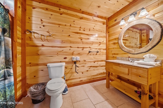 3238 Smoky Ridge Way, Sevierville, TN 37862 - bathroom with tile patterned flooring, vanity, toilet, wooden walls, and wooden ceiling