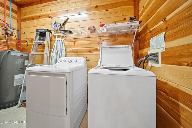 3238 Smoky Ridge Way, Sevierville, TN 37862 - laundry room with laundry area, washer and clothes dryer, wood walls, and electric water heater
