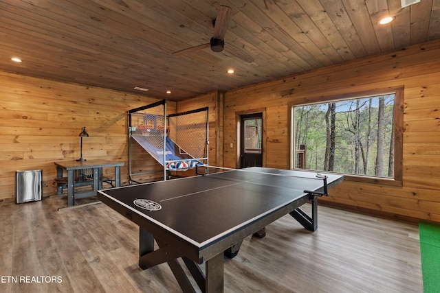 playroom with wood ceiling, wood finished floors, wooden walls, and recessed lighting