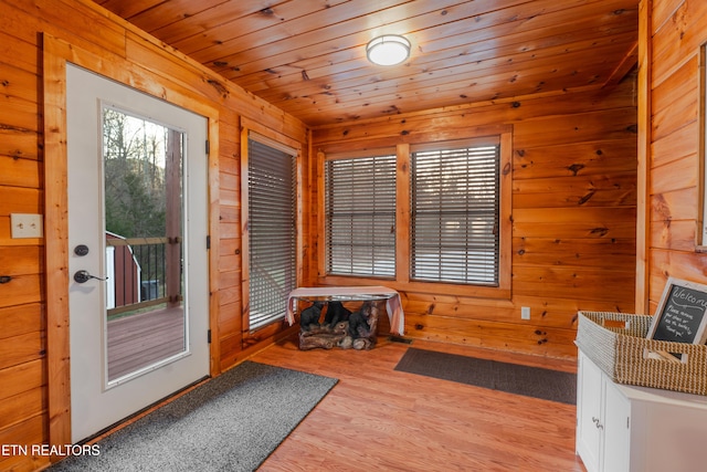 1218 Sugar Loaf Rd, Sevierville, TN 37876 - doorway with wood walls, wood finished floors, and wood ceiling