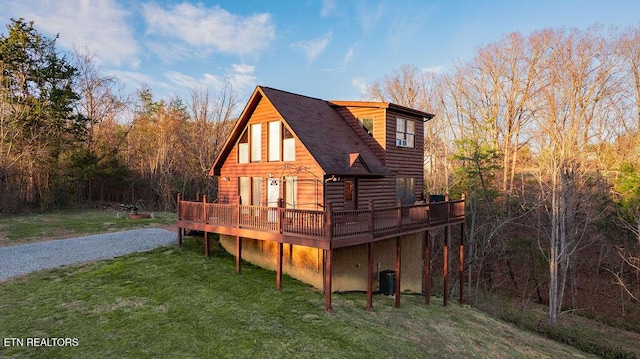 1218 Sugar Loaf Rd, Sevierville, TN 37876 - back of house featuring a deck and a yard