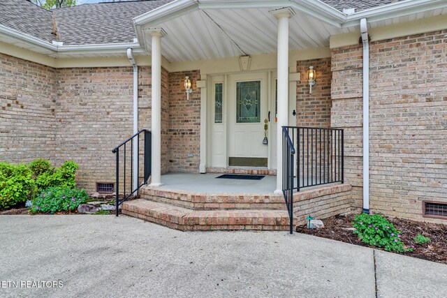 662 Laurel Cir, Crossville, TN 38555 - entrance to property featuring crawl space, brick siding, and a shingled roof