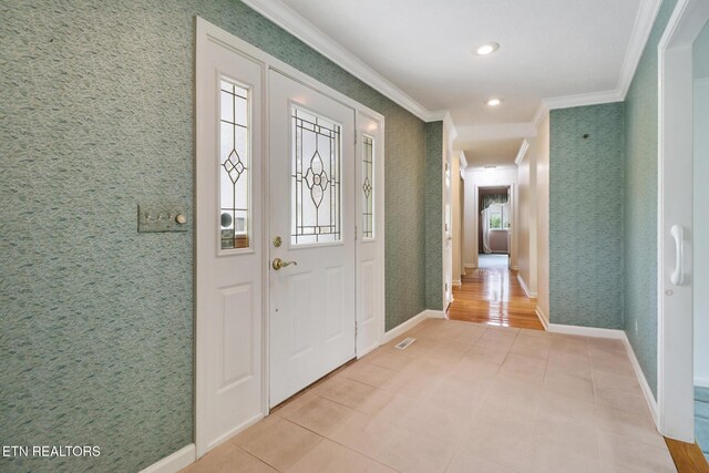 662 Laurel Cir, Crossville, TN 38555 - foyer entrance with wallpapered walls, baseboards, and crown molding
