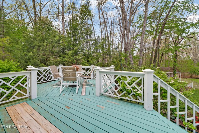 662 Laurel Cir, Crossville, TN 38555 - wooden deck featuring outdoor dining area