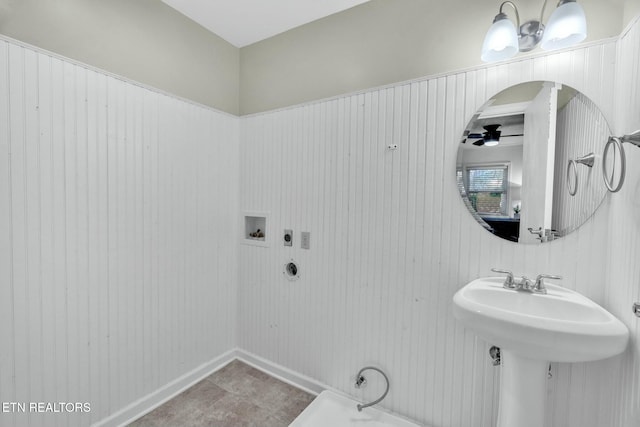 bathroom featuring a sink and ceiling fan