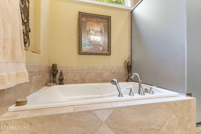 bathroom with a garden tub