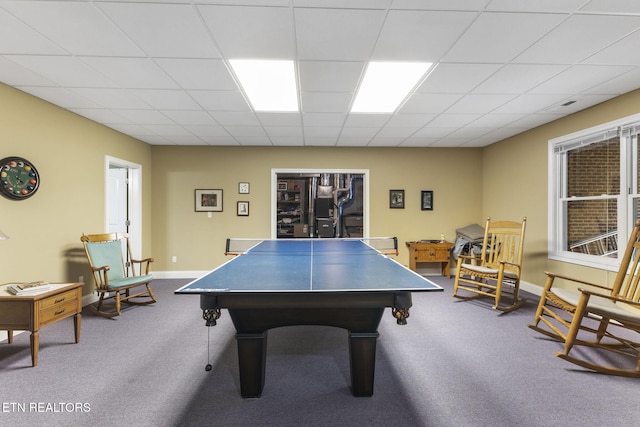 playroom with baseboards, carpet flooring, and a drop ceiling