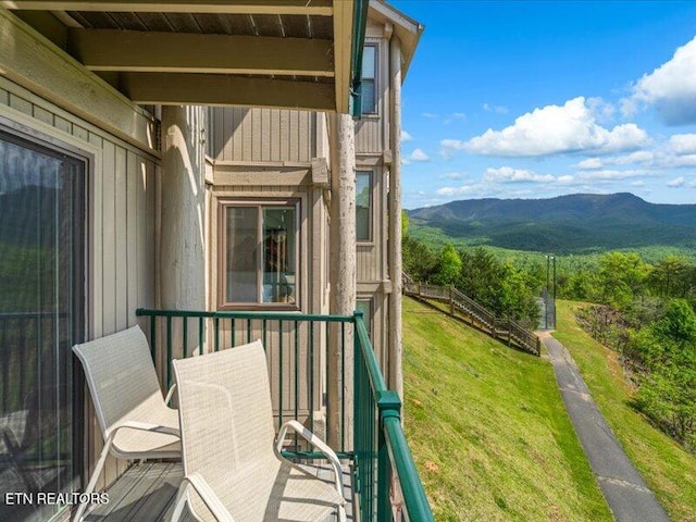 balcony featuring a mountain view