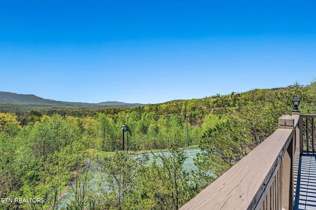 property view of mountains with a wooded view