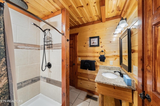 1230 Bird Nest Way, Sevierville, TN 37862 - bathroom with a stall shower, wood ceiling, wood walls, tile patterned floors, and vanity