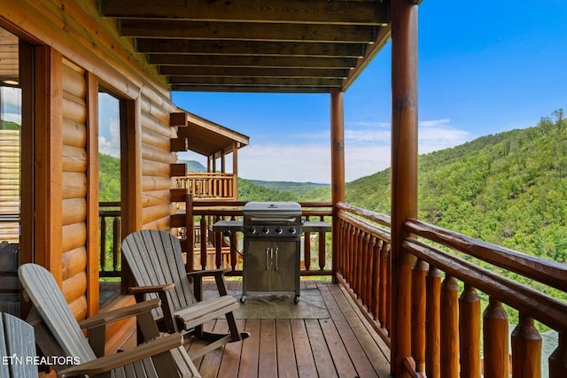 1230 Bird Nest Way, Sevierville, TN 37862 - wooden terrace with a view of trees and area for grilling