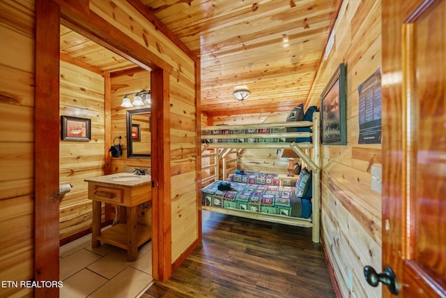1230 Bird Nest Way, Sevierville, TN 37862 - hallway with wooden ceiling, wood walls, wood finished floors, and a sink