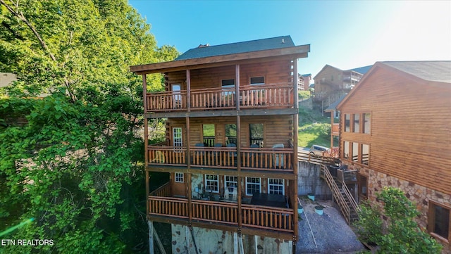 1230 Bird Nest Way, Sevierville, TN 37862 - rear view of house featuring a balcony