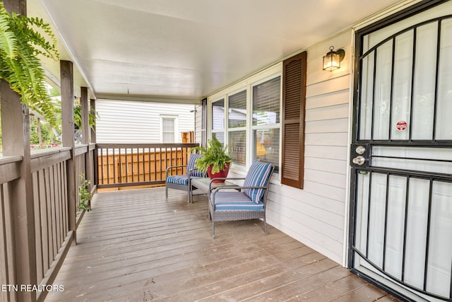 wooden deck with a porch