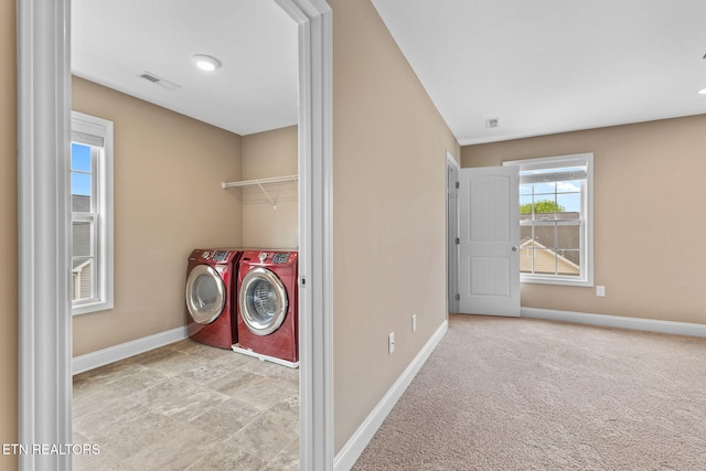 101 Fortenberry St, Oak Ridge, TN 37830 - laundry area with visible vents, washer and clothes dryer, laundry area, and baseboards
