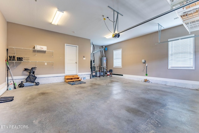 101 Fortenberry St, Oak Ridge, TN 37830 - garage featuring a garage door opener and gas water heater