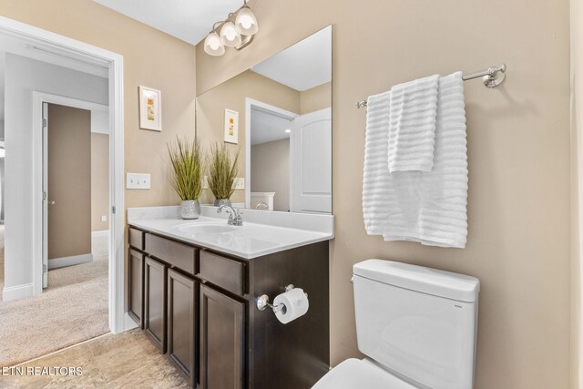 101 Fortenberry St, Oak Ridge, TN 37830 - half bath featuring toilet, vanity, and baseboards