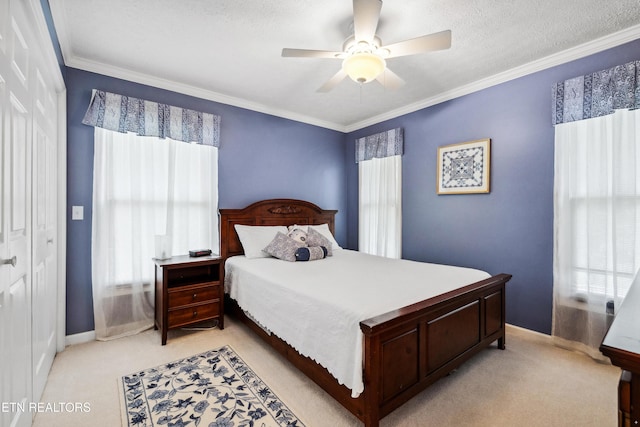 bedroom with baseboards, light carpet, and crown molding