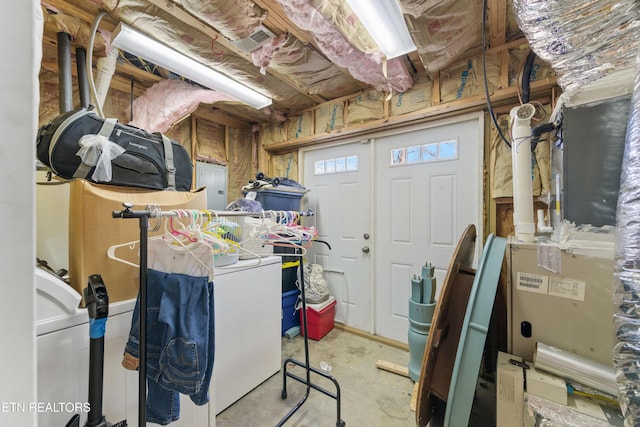 unfinished below grade area featuring washer / dryer and electric panel