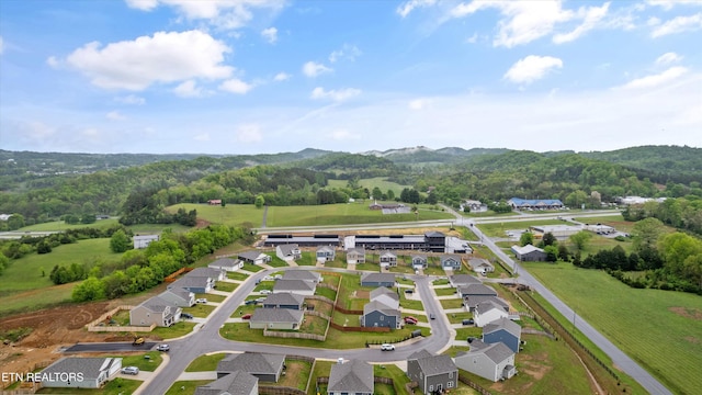aerial view with a mountain view and a residential view