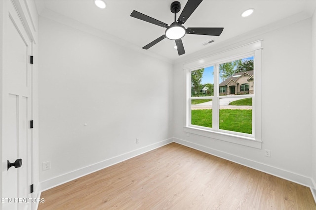 spare room featuring visible vents, baseboards, recessed lighting, a ceiling fan, and light wood-style flooring