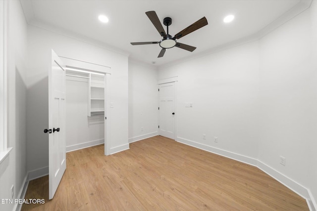 unfurnished bedroom featuring recessed lighting, baseboards, and light wood-type flooring