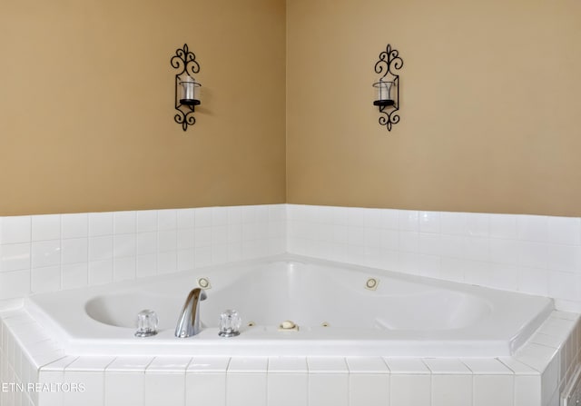 bathroom featuring a whirlpool tub