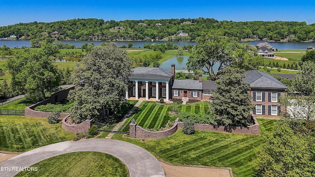 birds eye view of property featuring a water view