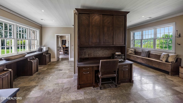 office featuring stone tile floors, baseboards, ornamental molding, and recessed lighting