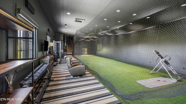 recreation room with recessed lighting and carpet
