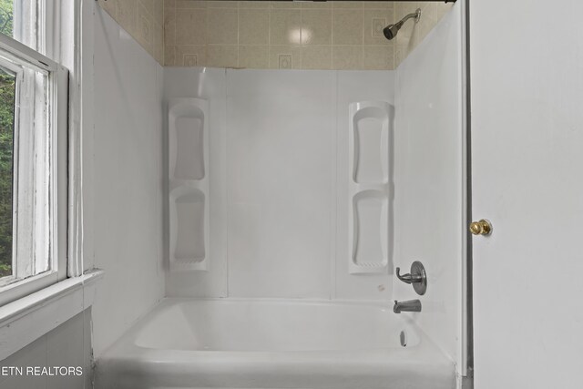 bathroom featuring shower / tub combination