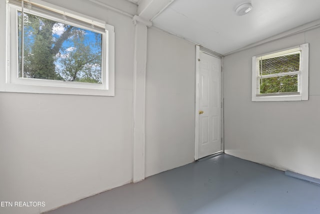 interior space featuring concrete flooring