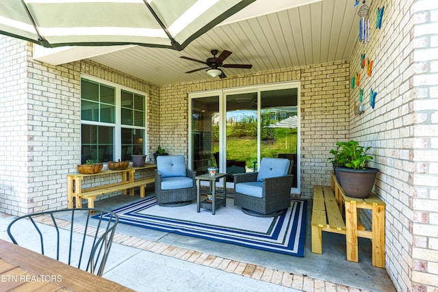 view of patio / terrace featuring a ceiling fan