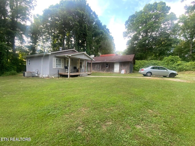 2789 Oak Grove Rd, Rocky Top, TN 37769 - single story home with a front lawn and covered porch