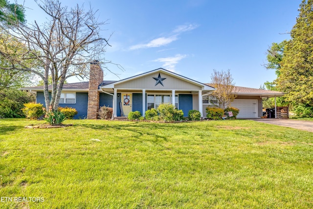 ranch-style home featuring driveway, a chimney, a front yard, and an attached garage