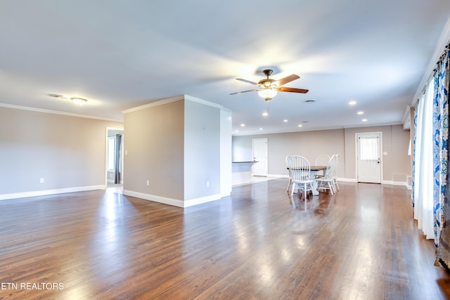 living area featuring baseboards, a ceiling fan, and dark wood-style flooring