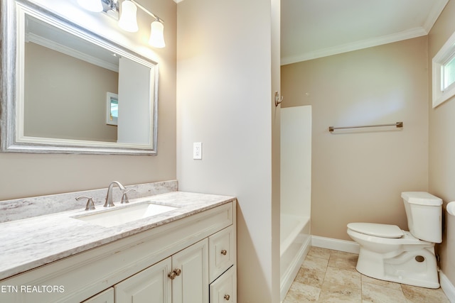 bathroom featuring baseboards, ornamental molding, toilet, and vanity