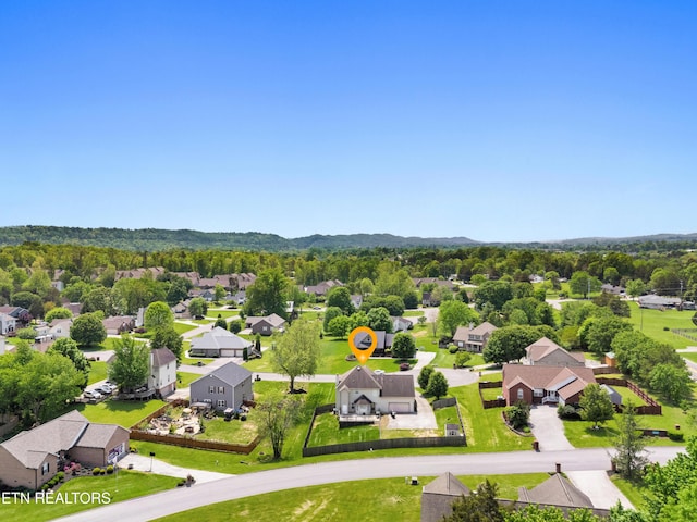 aerial view with a mountain view and a residential view