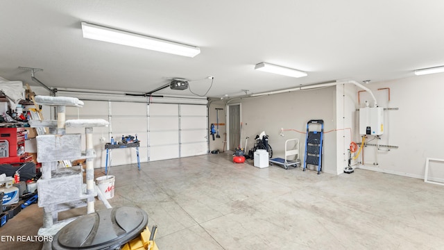 garage with tankless water heater and a garage door opener