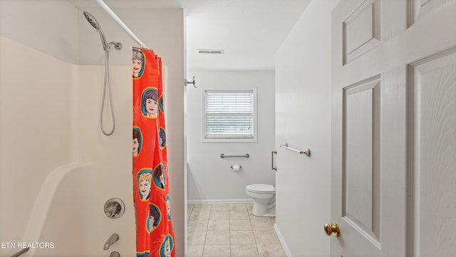 full bathroom featuring visible vents, tile patterned flooring, baseboards, toilet, and shower / tub combo with curtain