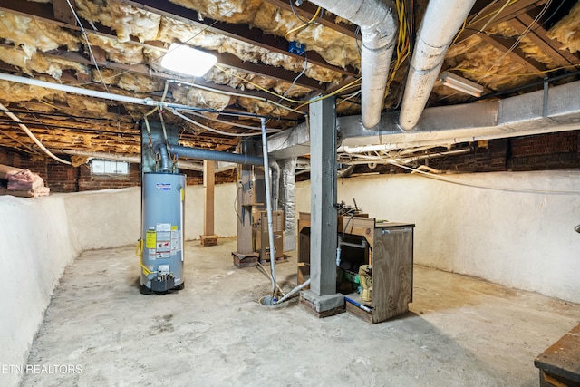 basement featuring gas water heater and heating unit