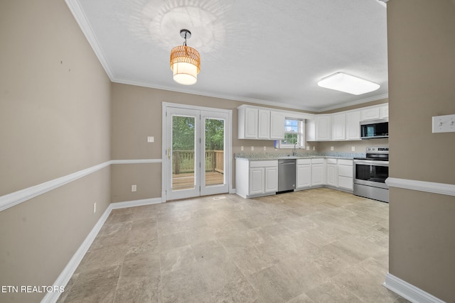 4762 Cabbage Ln, Knoxville, TN 37938 - kitchen with white cabinets, a sink, stainless steel appliances, baseboards, and ornamental molding