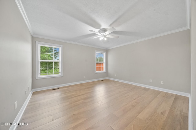 4762 Cabbage Ln, Knoxville, TN 37938 - empty room with crown molding, a textured ceiling, ceiling fan, and light wood-style floors