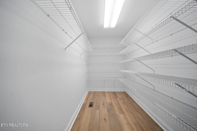4762 Cabbage Ln, Knoxville, TN 37938 - spacious closet featuring wood finished floors and visible vents