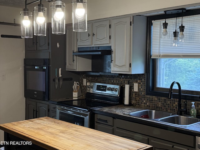 391 Underwood Grove Rd, Cumberland Gap, TN 37724 - kitchen with stainless steel range with electric stovetop, butcher block countertops, extractor fan, oven, and decorative backsplash